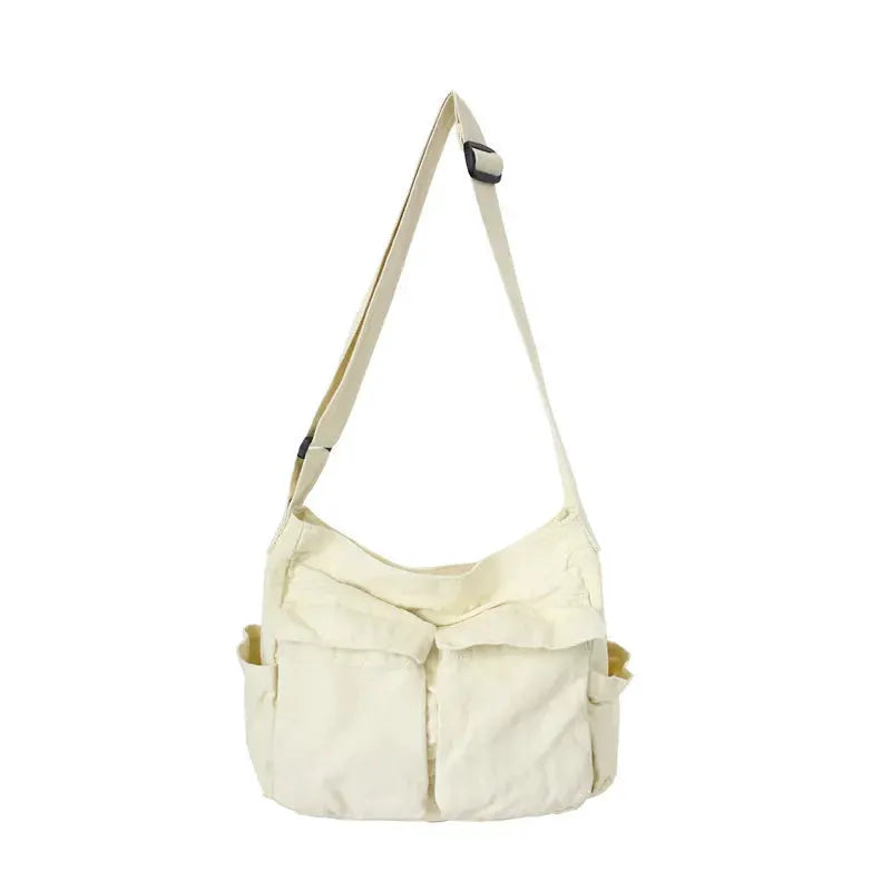 Simples Market women's canvas messenger bag, cream with front pockets and adjustable strap; large capacity