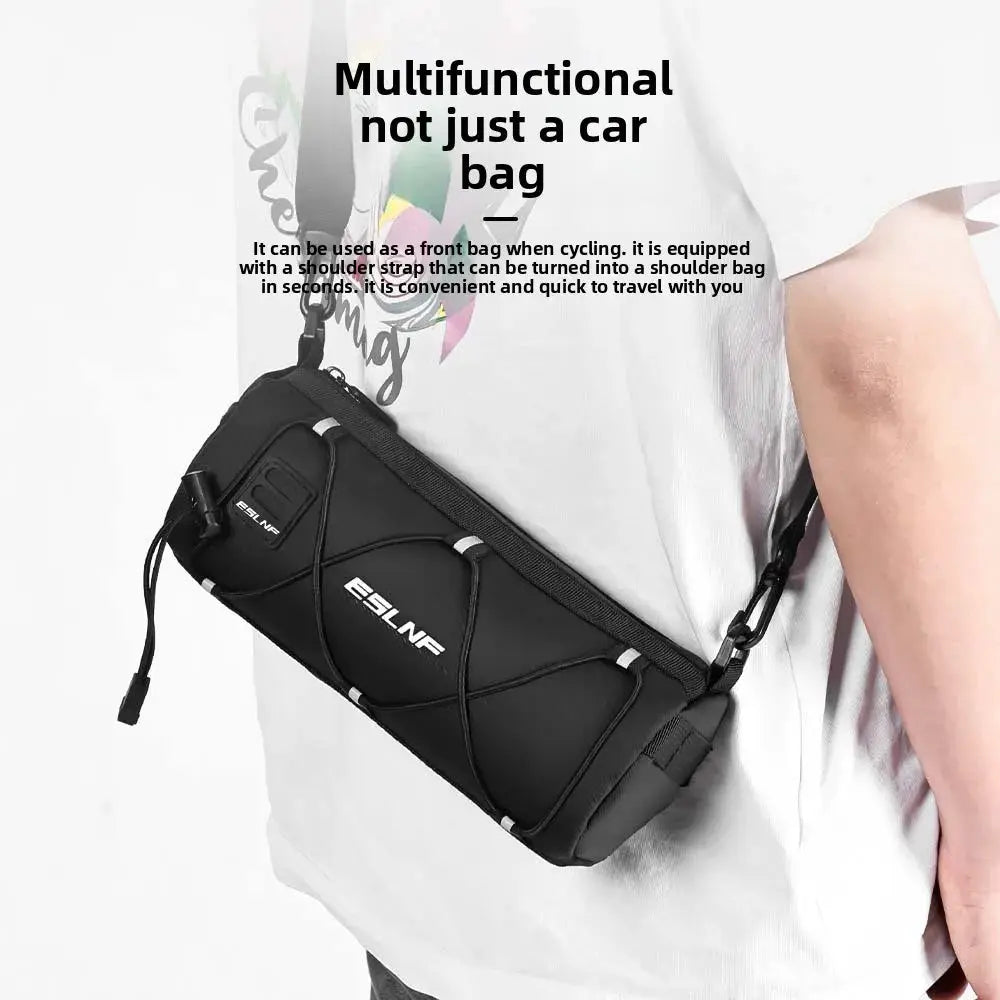 Multifunctional waterproof bike front bag shown being carried, designed for cyclists with a shoulder strap.