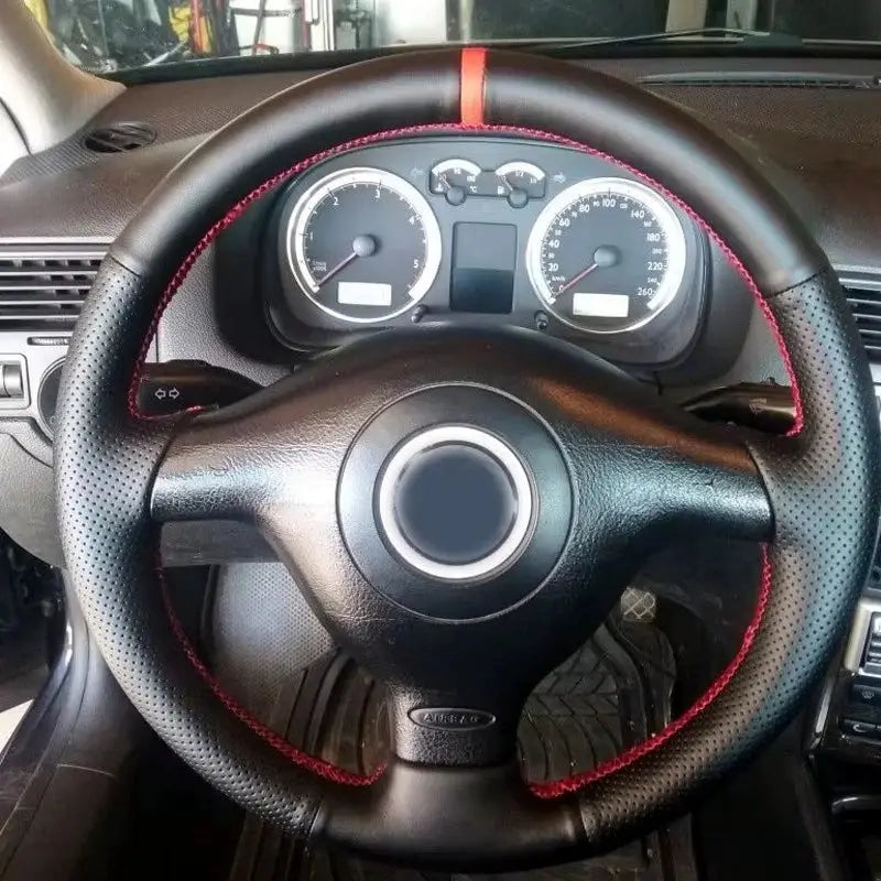 Steering wheel cover, non-slip black leather braided with red stitching for VW Golf 4 / Passat B5