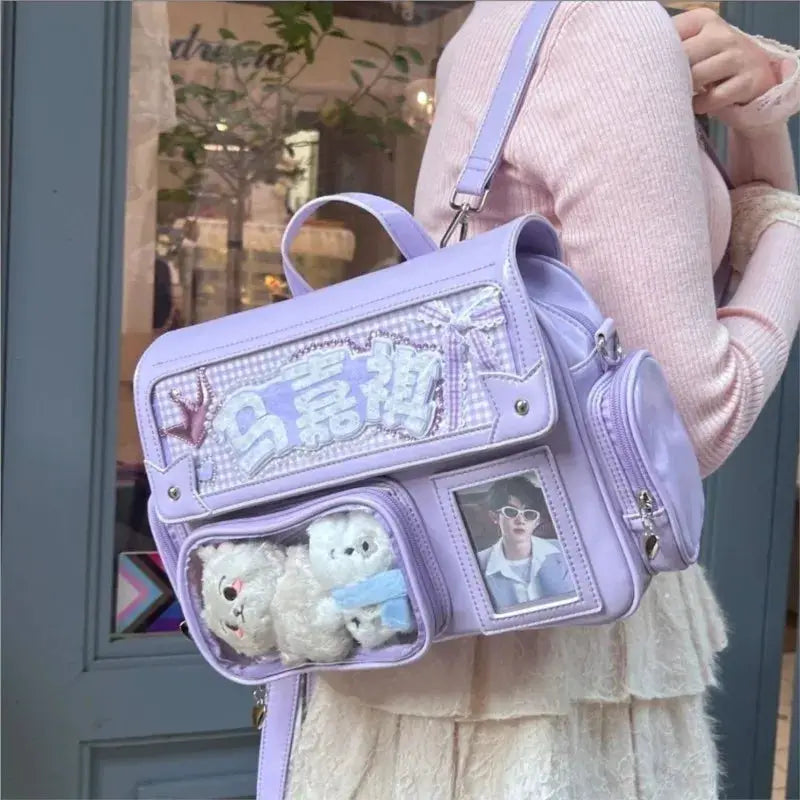 Lavender Ita bag backpack for women by Simples Market; faux-leather with clear front pocket and photo window