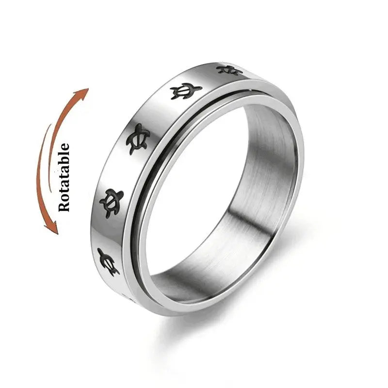 Stainless steel fidget spinner ring with rotating band and small symbol motifs