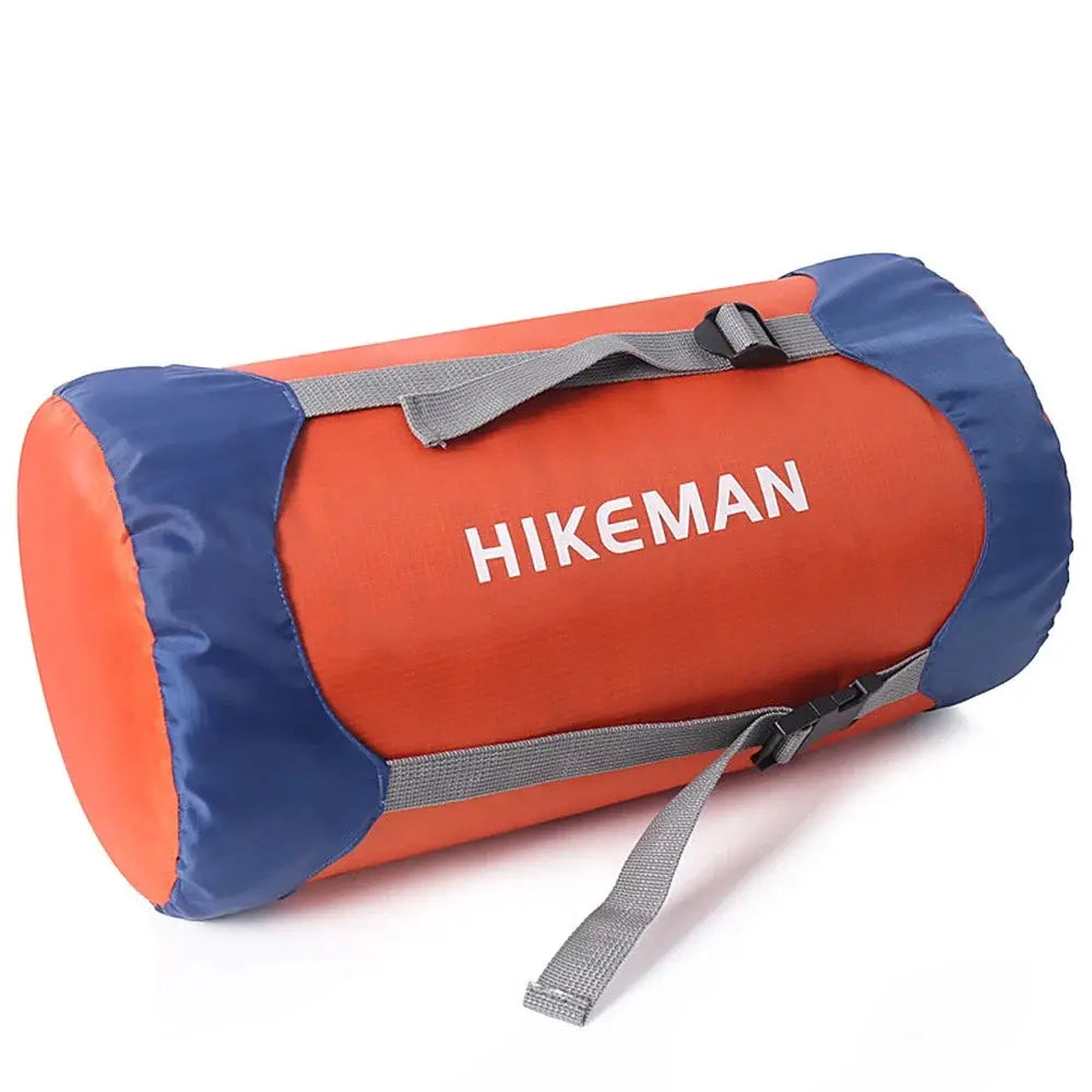HIKEMAN sleeping bag compression storage bag, orange with blue ends, gray straps; waterproof and portable.