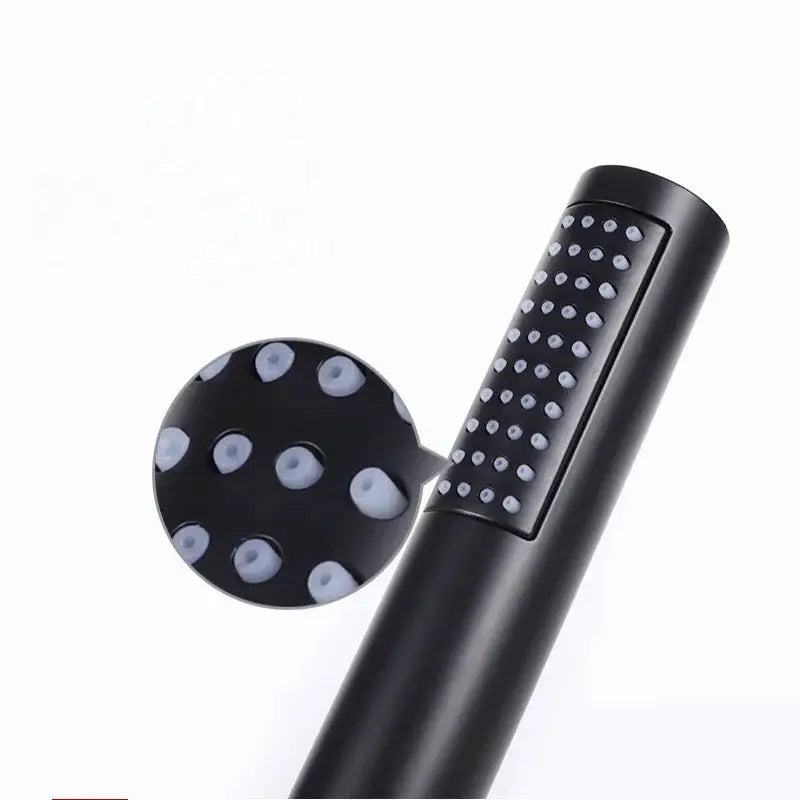 Hand-held black plastic shower head with silicone nozzles and aerator for rainfall and high-pressure spray