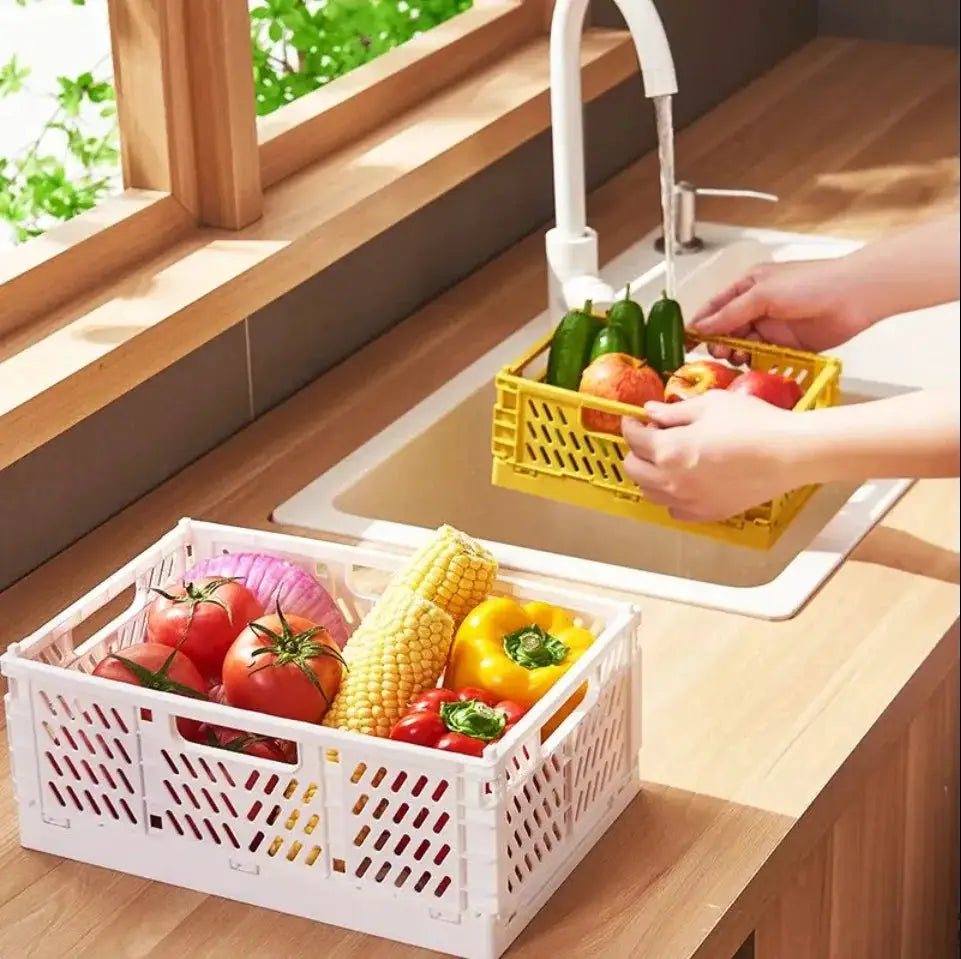 Plastic foldable storage crates; white and yellow ventilated baskets for kitchen storage (2 crates shown)