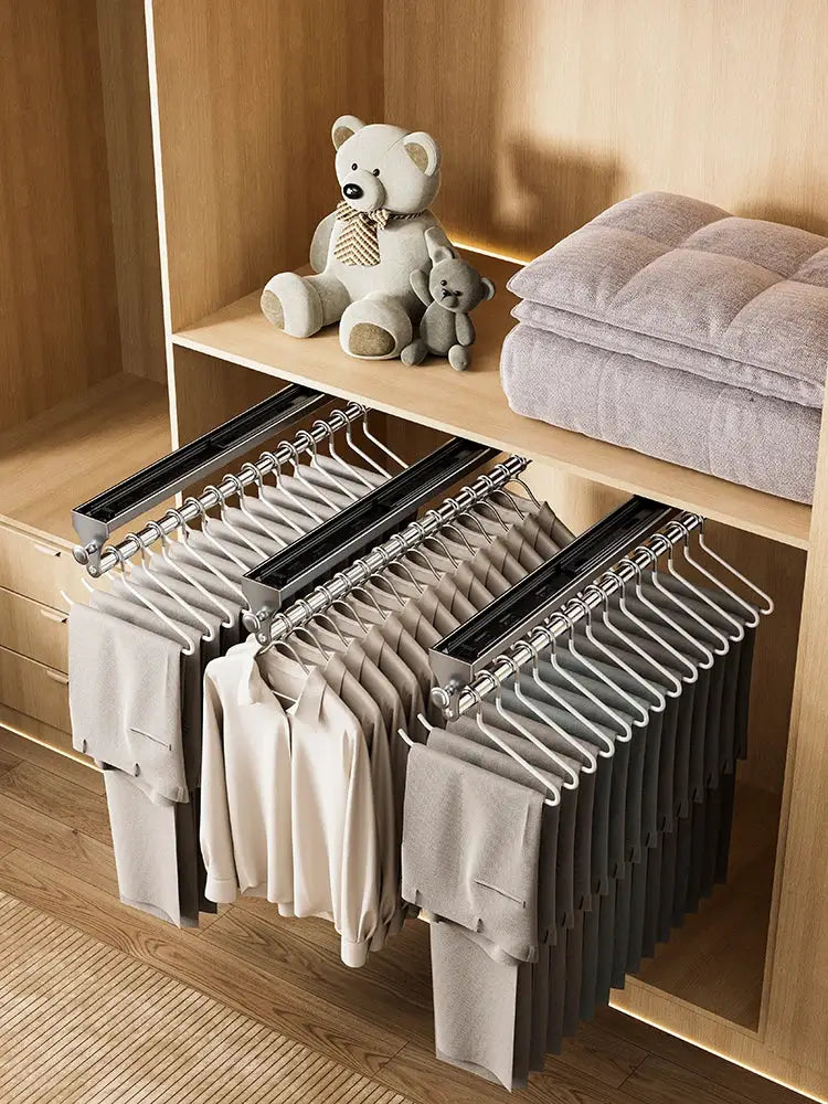 Pull-out trouser hangers wardrobe organizer with three rails of white non-slip hangers