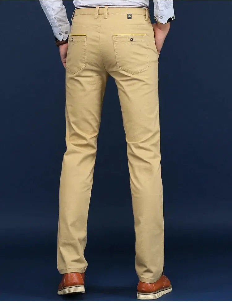 Simples Market men's khaki cotton casual trousers, back view with belt loops and yellow trim rear pockets.