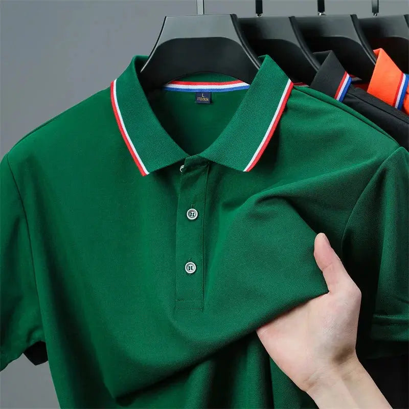 Men's polo shirts on hangers; green solid short-sleeve polo with striped collar, other colors visible (4 shirts)