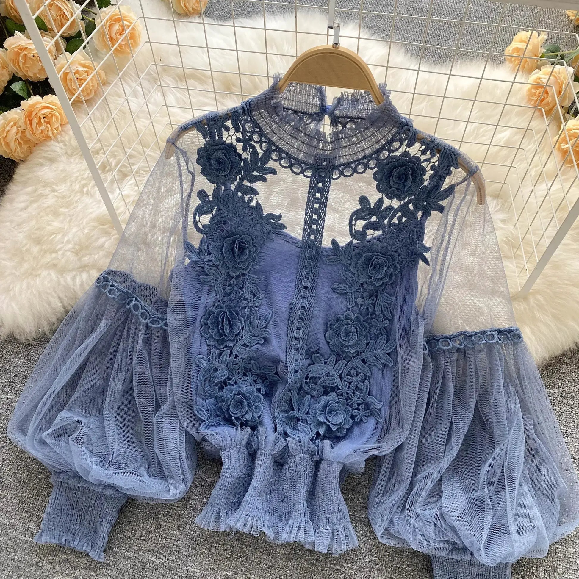 Blue lace puff long-sleeve blouse with sheer tulle and floral appliqué