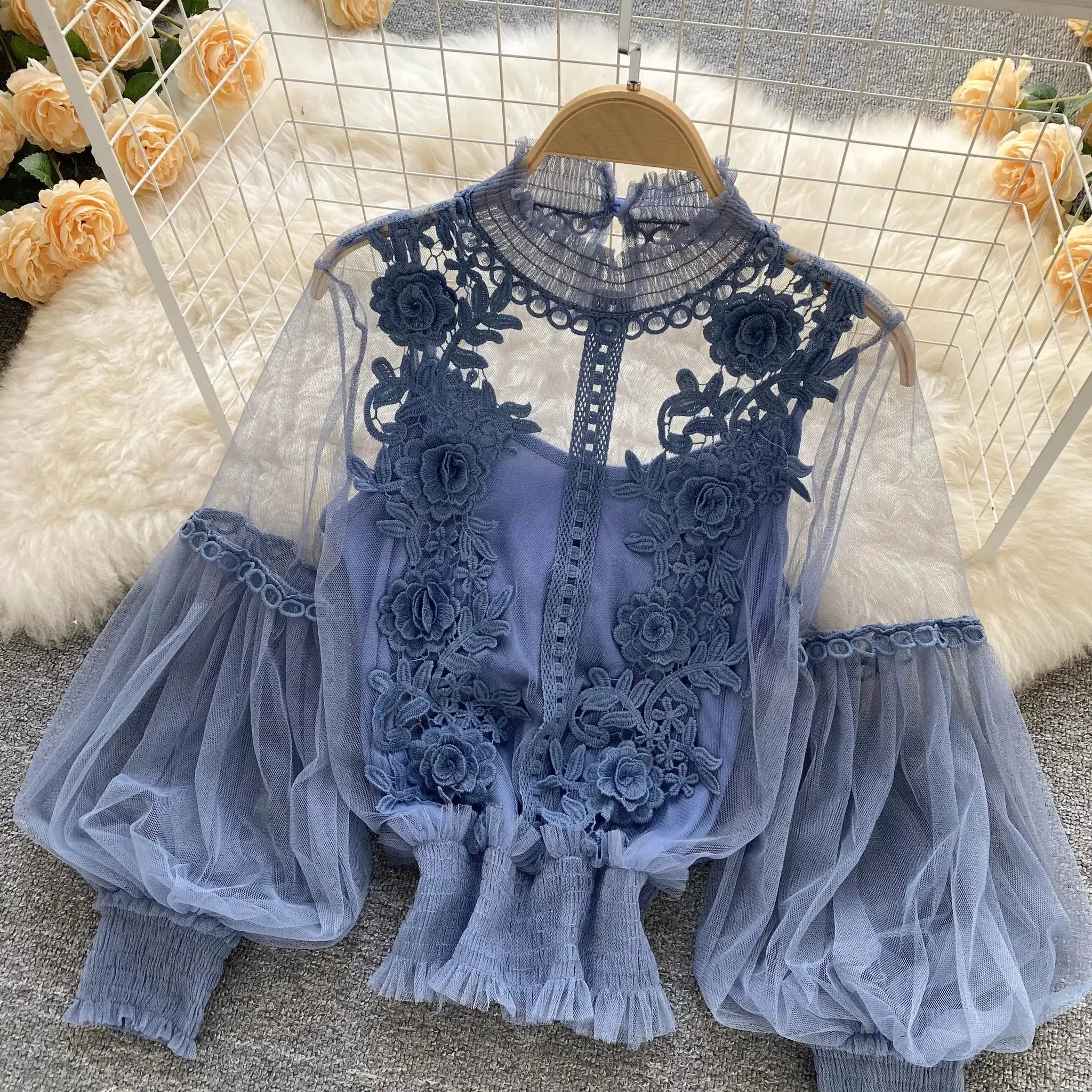 Blue lace puff long-sleeve blouse with sheer tulle and floral appliqué
