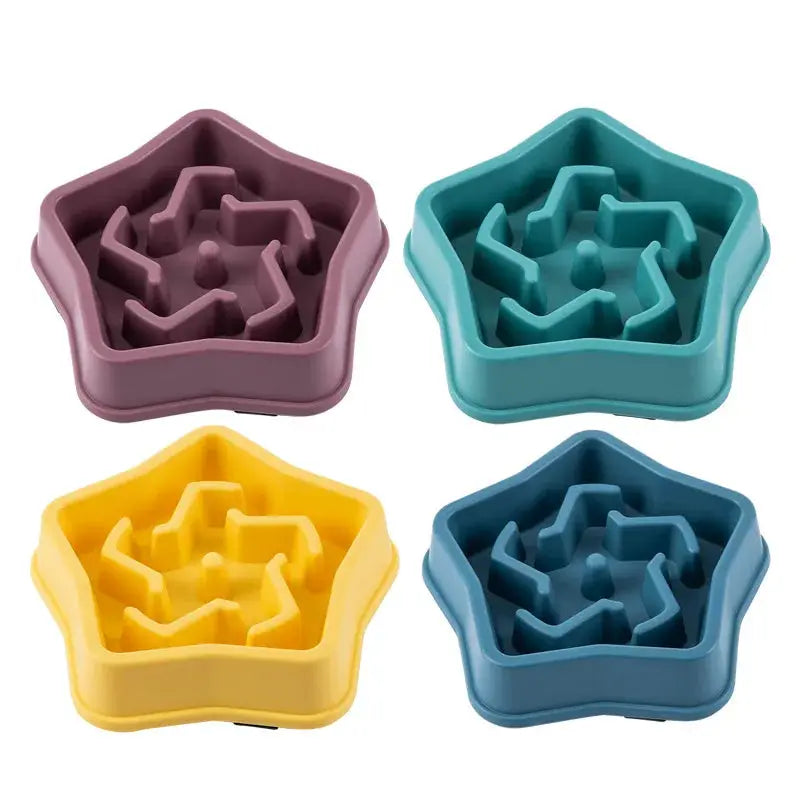 Pet star-shaped slow-feed bowls by Simples Market, set of 4 in purple, teal, yellow, and blue