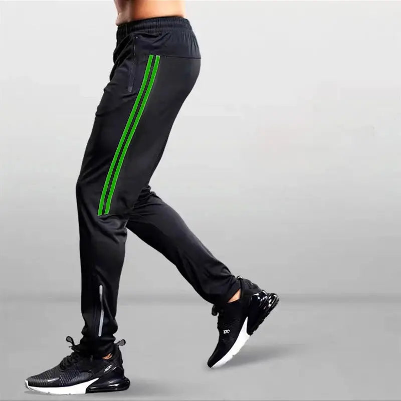 Men's jogging sport pants, black with neon green side stripes, for gym and running