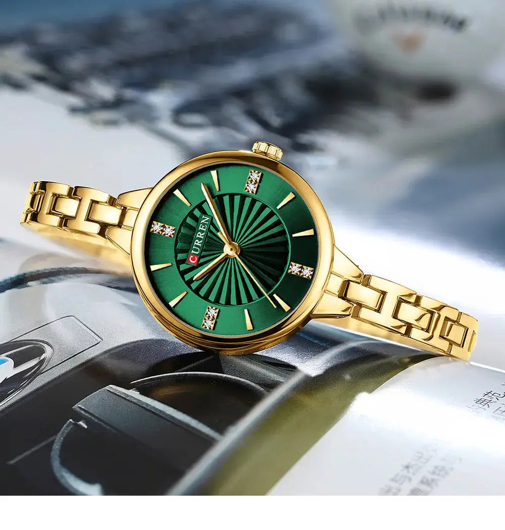 CURREN women's quartz watch in gold-tone stainless steel with green dial and crystal markers