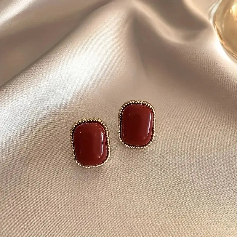 Wine red square stud earrings with gold-tone rope edging, 2 earrings