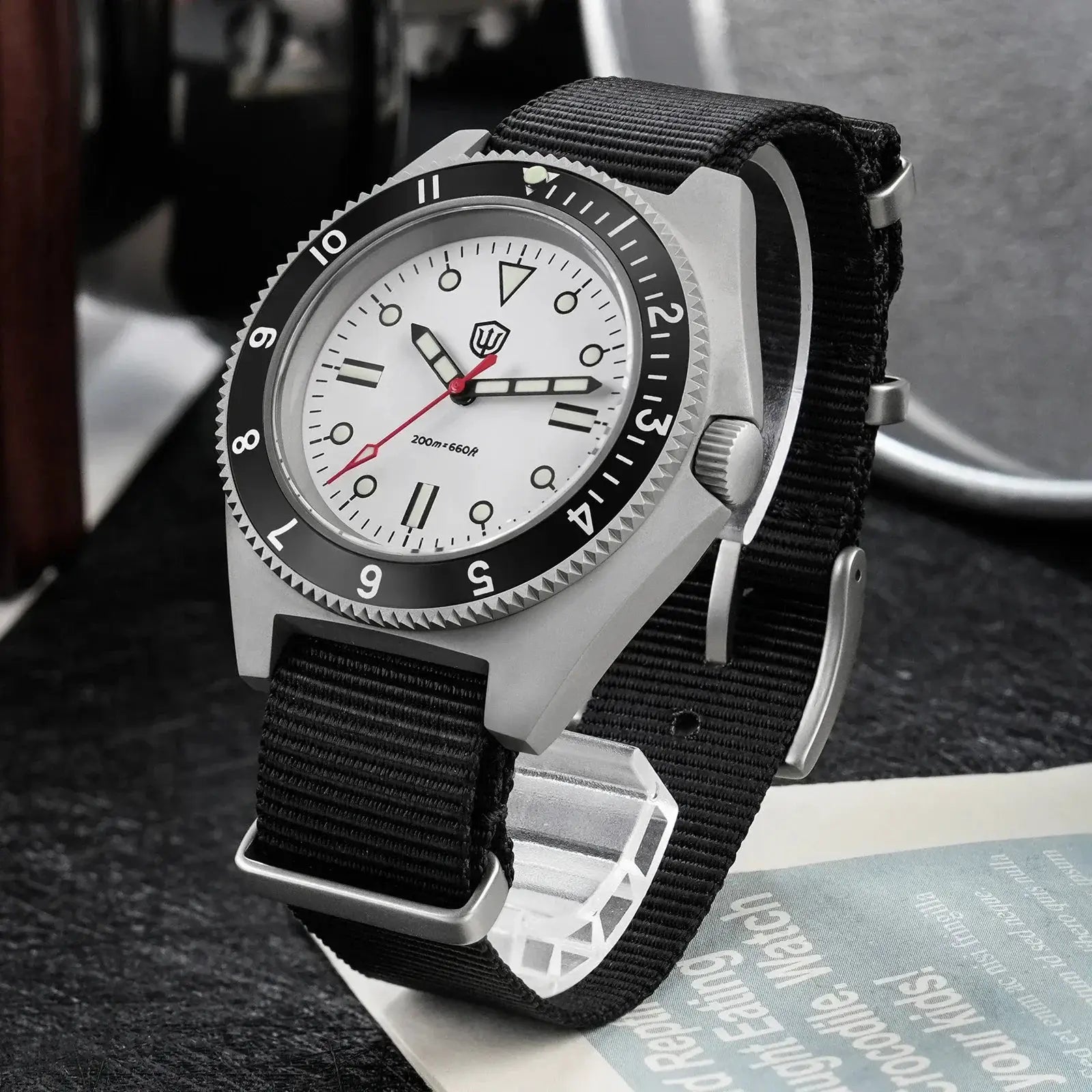 Watchdives WD1972 quartz dive watch with white dial, luminous hands, 200m water resistance, black bezel, black fabric strap