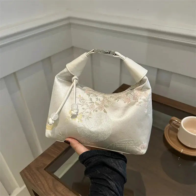 Chinese style embroidery handbag by Simples Market, cream satin with floral pattern, tassel drawstring, shoulder bag