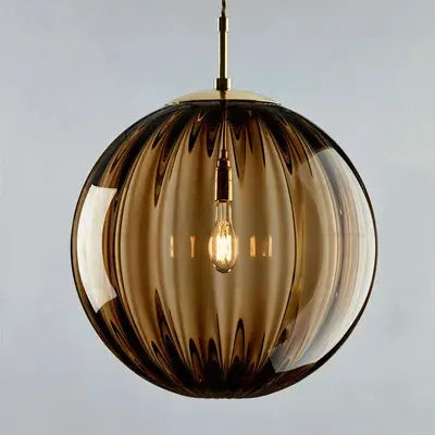 Pendant light Simples Market LED glass ball in smoky amber with brass hardware