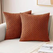 Fall decorative corduroy throw pillow covers in burnt orange with ribbed texture on a light sofa, set of 2