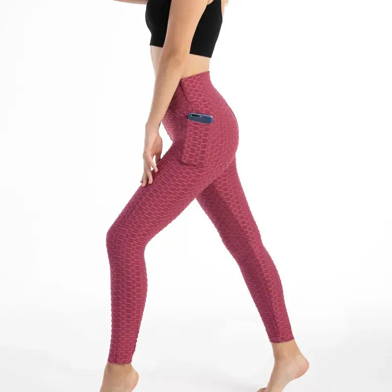 Women’s pocket bubble leggings by Simples Market, pink high-waisted, stretchy slim fit with side phone pocket.