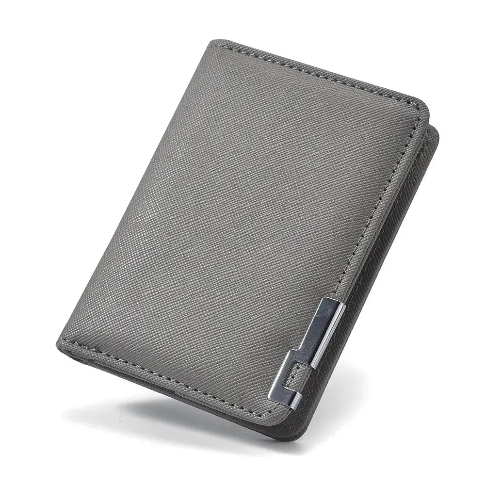 Wallet in black faux-leather with a slim profile and metal clasp
