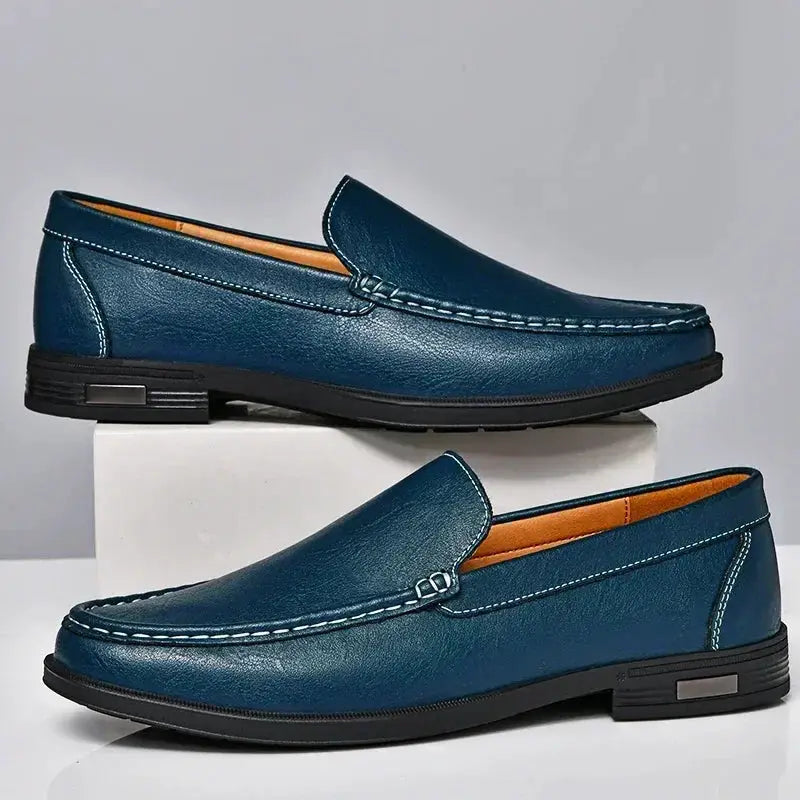 Simples Market blue leather men's slip-on loafers; pair with black soles and white contrast stitching