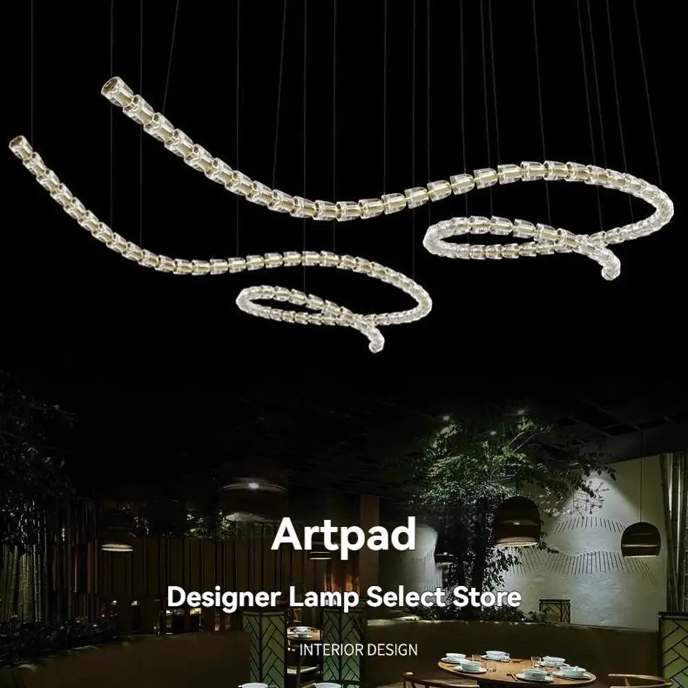 Chandelier ceiling light with multi-strand clear crystal acrylic beads and adjustable chain for living room.
