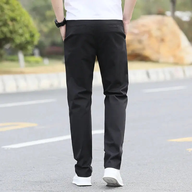 Men's black cotton chinos with breathable straight fit, sizes W28–W40