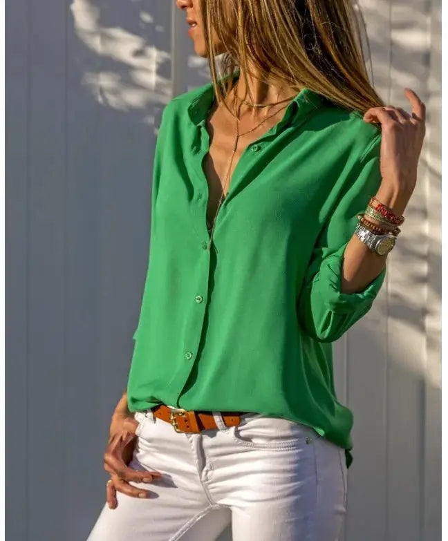Autumn shirt green polo-collar blouse for women with button-down front, loose fit, paired with white pants