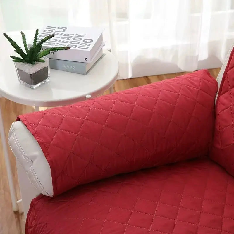 Solid red quilted recliner sofa cover by Simples Market; anti-slip, pet-friendly armchair protector.
