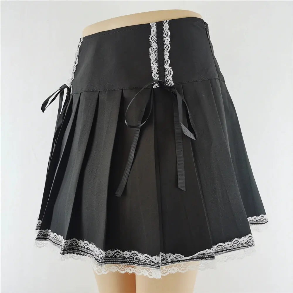 Harajuku Punk Gothic black high-waist pleated skirt by Simples Market with white lace trim and ribbon ties