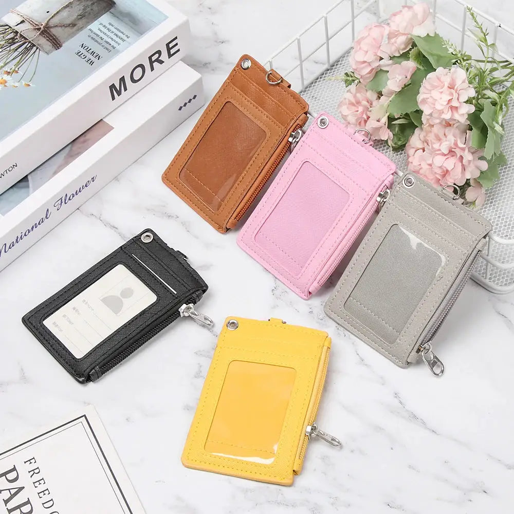 PU leather card holder wallets with ID windows and key rings; five colors (brown, pink, gray, black, yellow).