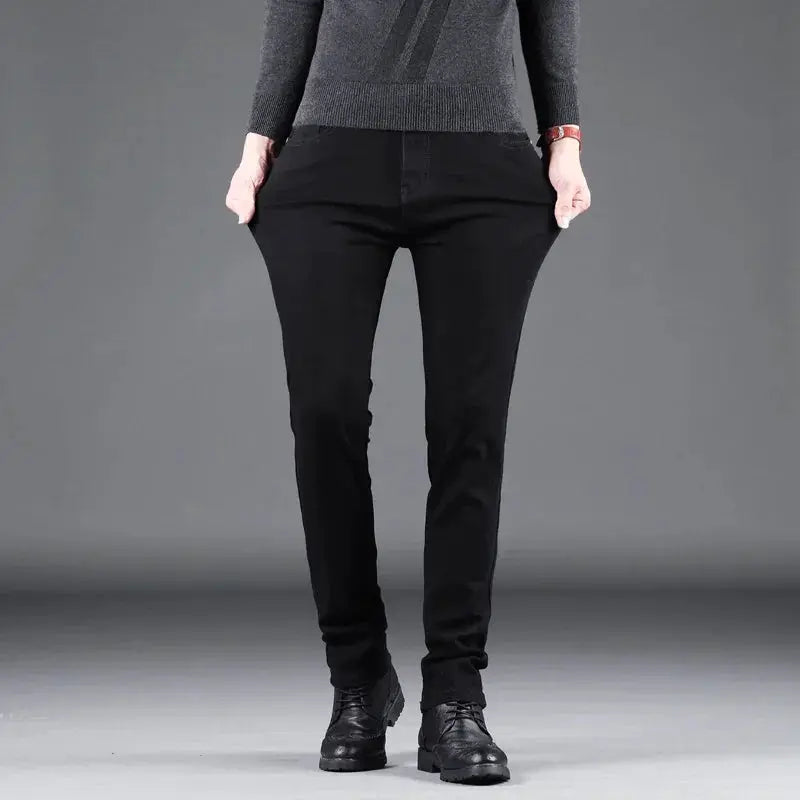 Men's black slim denim jeans with straight-leg fit for casual-business looks