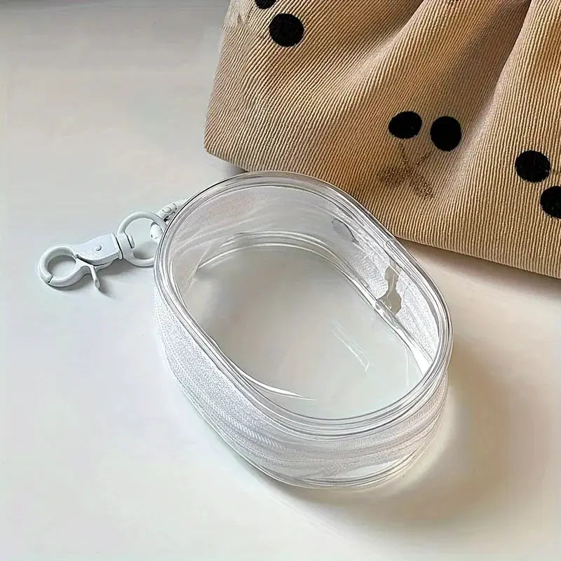 Portable mini clear zipper storage bag by Simples Market with keychain loop, oval organizer for earphones and chargers