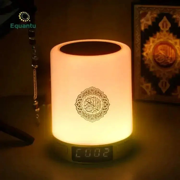 Portable multifunctional sound machine night light with warm amber glow and Arabic emblem