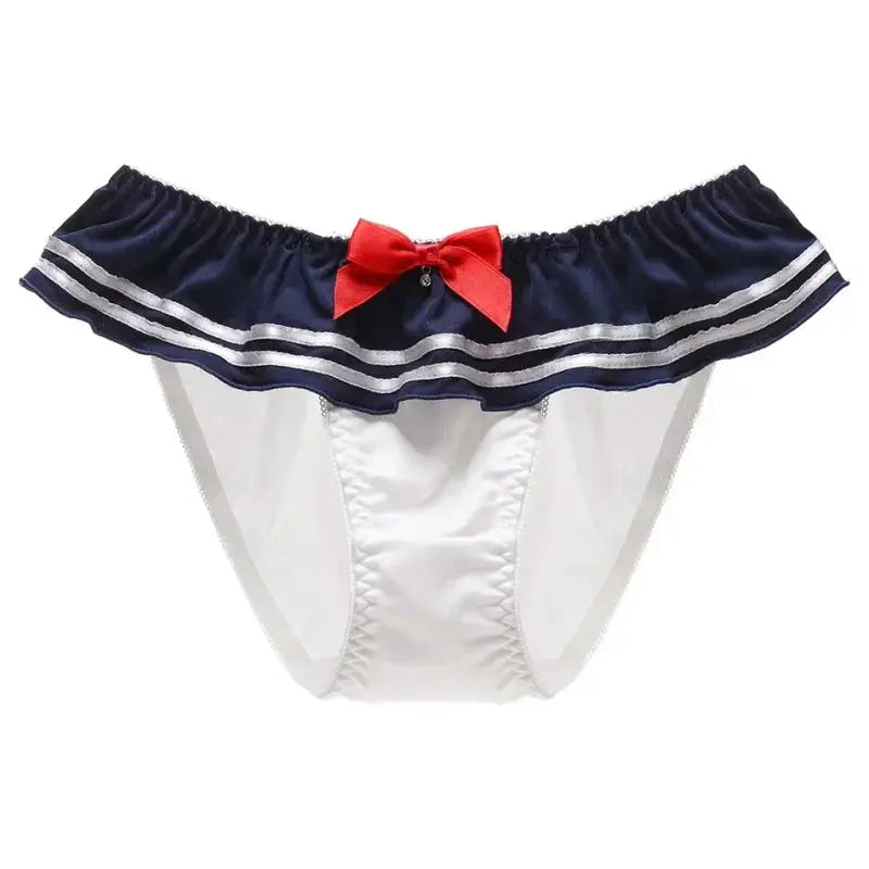 Women's panties with navy frill waistband, white body, and a red bow