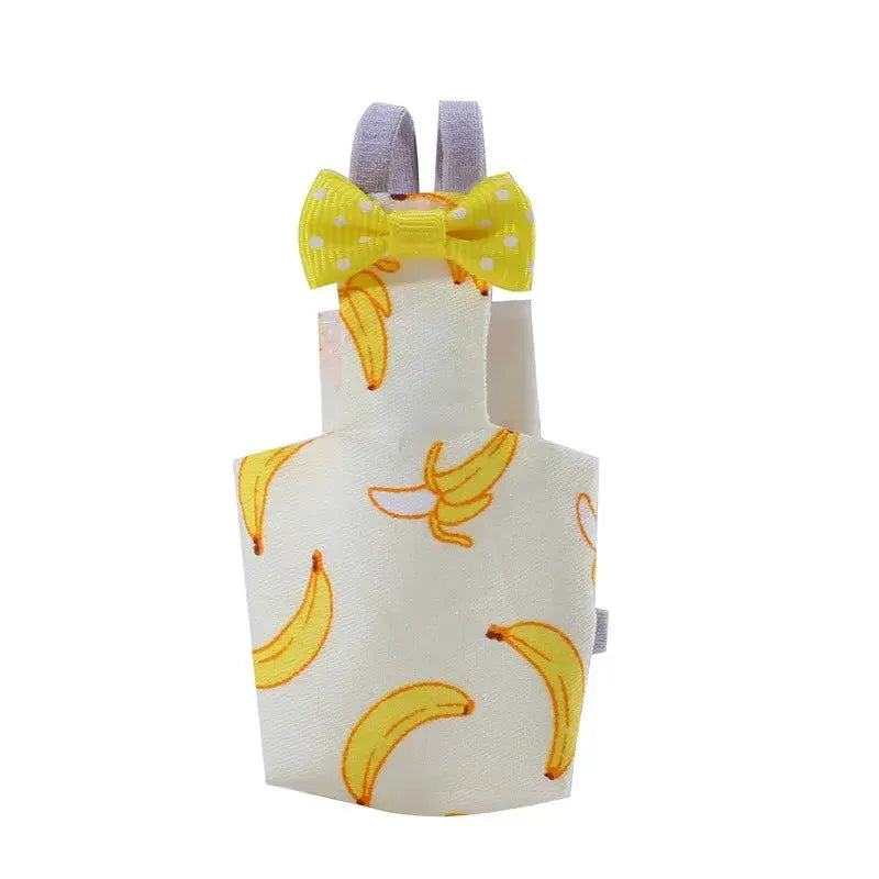 Parrot diaper with bowtie for small birds; banana-print fabric, purple straps, yellow polka-dot bow