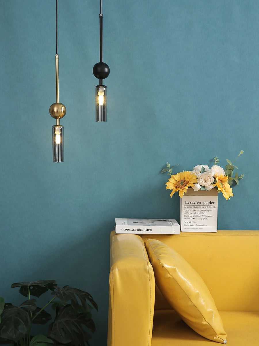Nordic Light Luxury Pendant Lights set of three by Simples Market in gold and black iron with glass shades