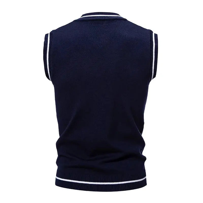 Men's navy knit vest, sleeveless with white ribbed trims at the neck, armholes and hem.