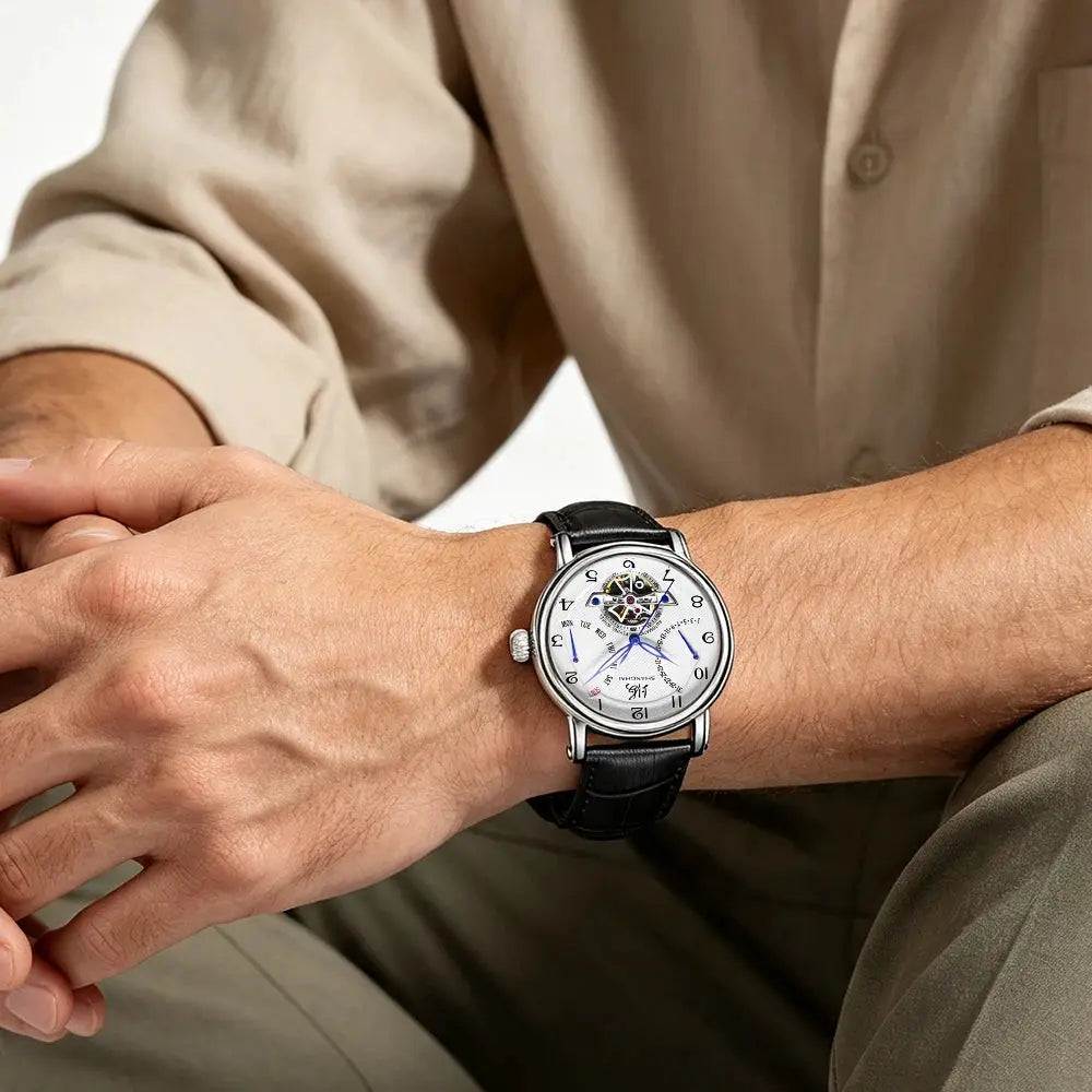 Shanghai Watch 42mm automatic wristwatch with silver stainless steel case, black leather strap, and open-heart dial