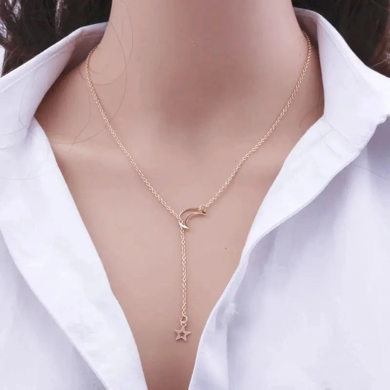 Moon star pendant choker necklace in gold-tone alloy chain for women with crescent moon and dangling star.