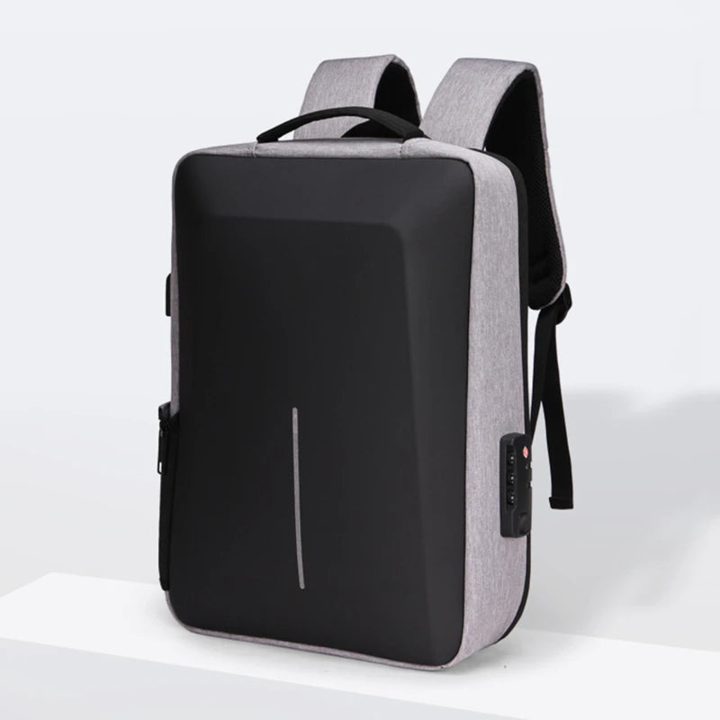 Men's anti-theft hard-shell backpack in grey with black front panel, adjustable straps and top handle