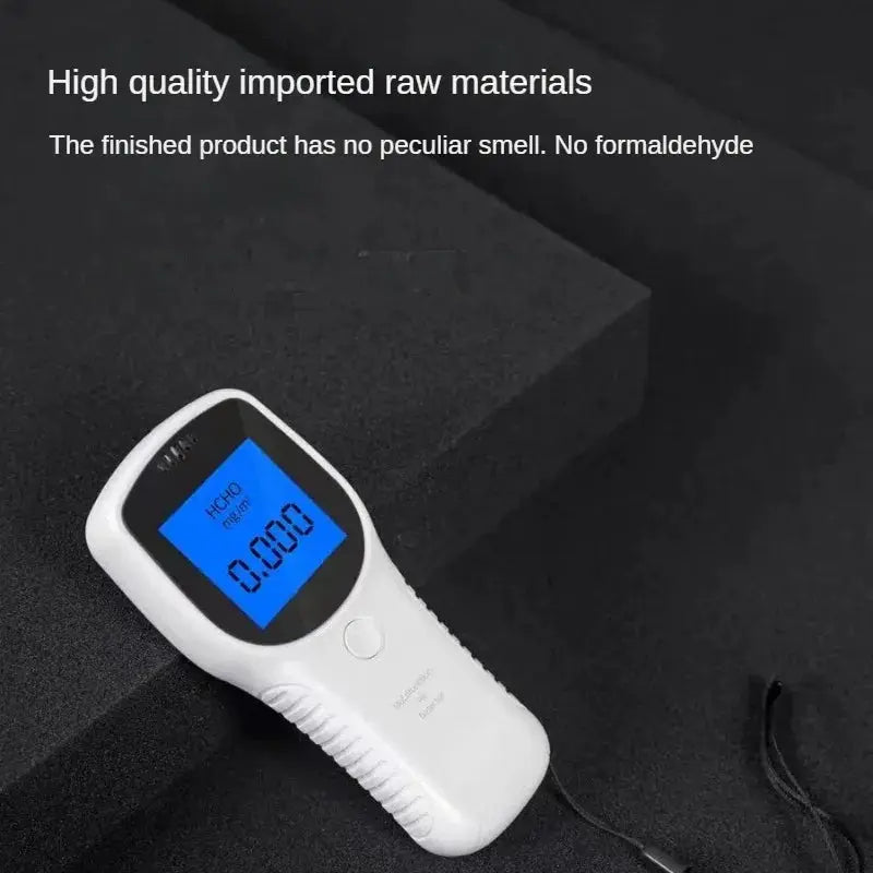 White handheld formaldehyde detector (HCHO) with blue LCD displaying 0.000.