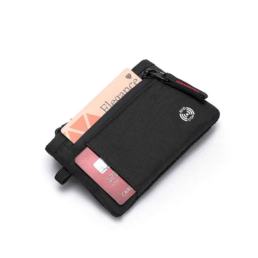 Credit card holder wallet in black nylon with zipper and RFID logo, cards peeking out