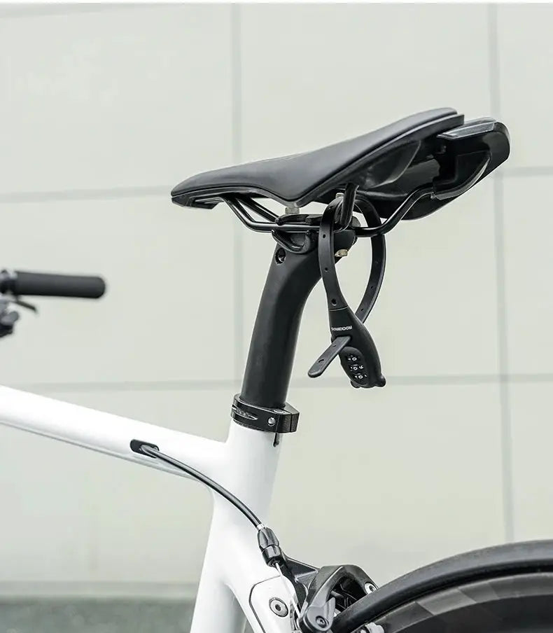 ROCKBROS portable bicycle lock with a zinc alloy combination lock, mounted under a bike saddle