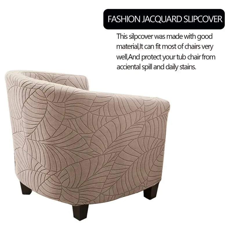 Elastic club chair slipcover in beige with leaf jacquard pattern by Simples Market.