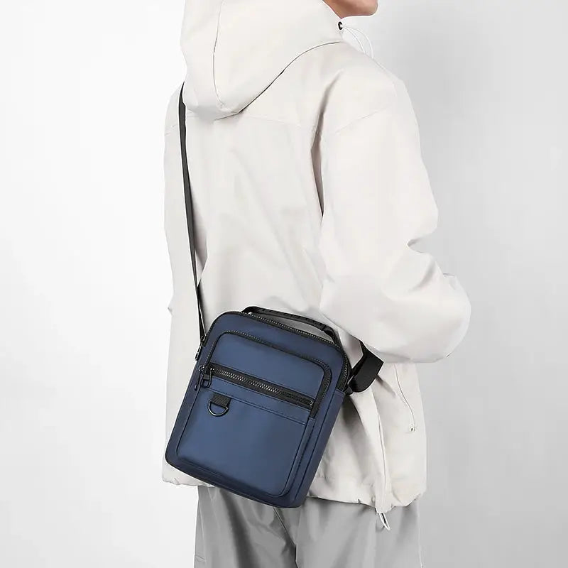 Messenger sling bag for men by Simples Market, blue Oxford mini crossbody phone bag with zip pockets