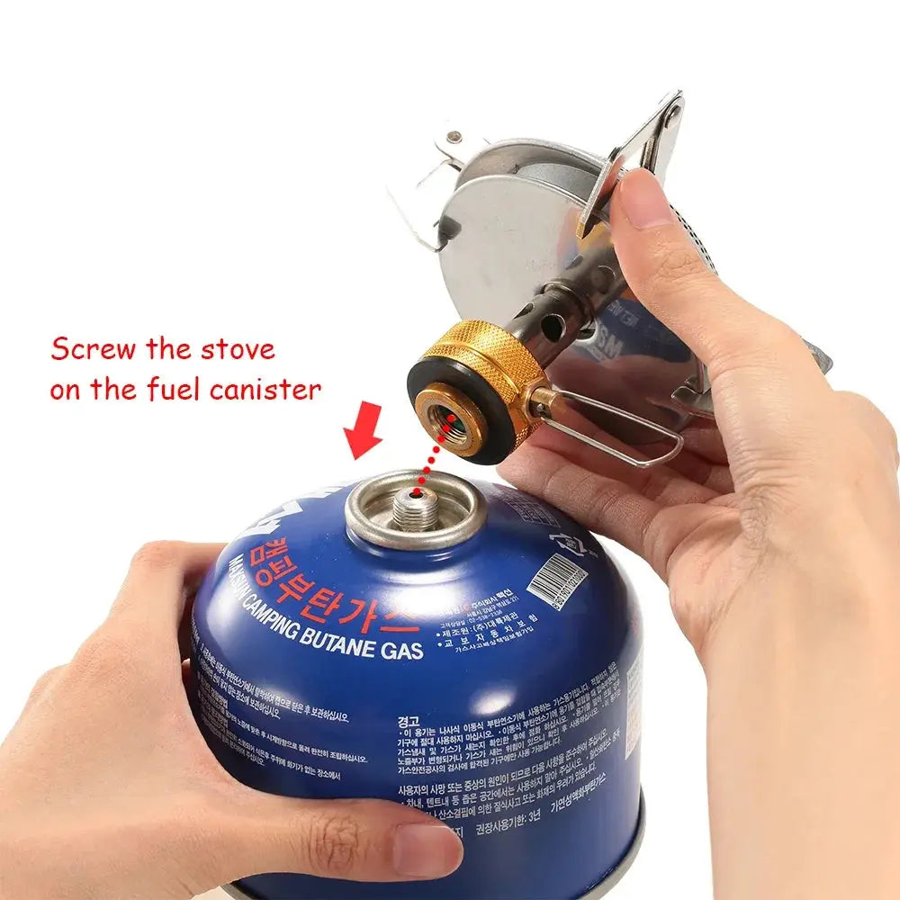 Simples Market outdoor camping gas stove with blue butane canister and brass burner