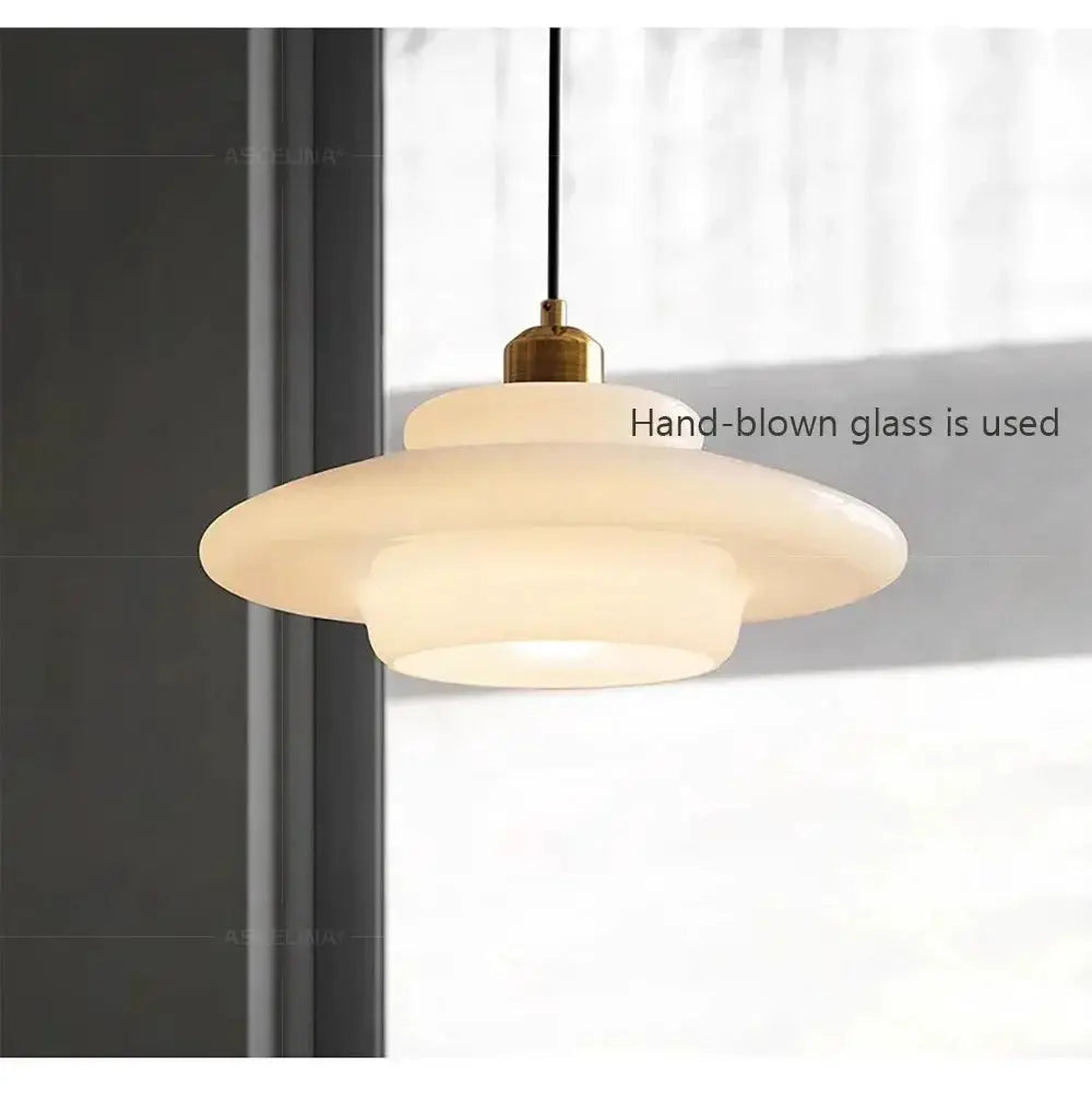 Nordic glass pendant lamp by Simples Market; hand-blown frosted glass with brass cap and black cord