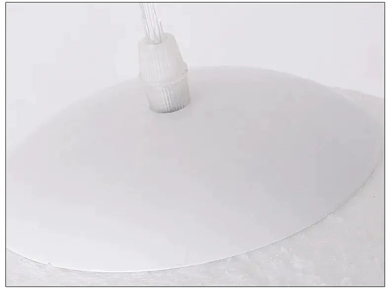 Nordic Moon LED pendant light by Simples Market, white round shade with cord.