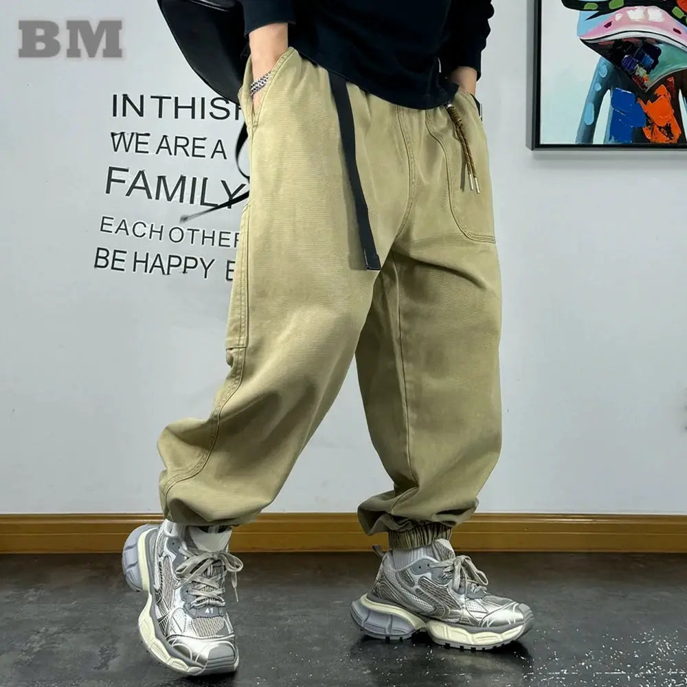 Baggy cargo pants by Simples Market in beige with drawstring waist