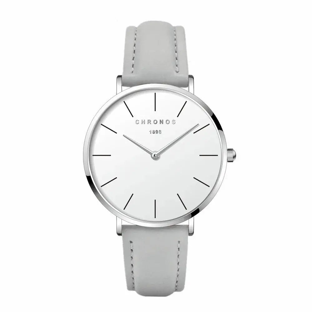 Chronos unisex minimalist quartz watch with white dial, silver case and light gray leather strap.